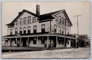 K47/ DeWitt Michigan RPPC Postcard c1910 Joe's Tavern Hotel Building 196
