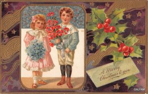  Kids with flower bouquets gold framed c 1910 Christmas postcard AH114 