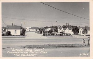 International Falls Minnesota Gateway Cabin Court Photo Postcard CC4296