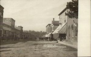 Bloomington WI Canal St. VISIBLE SIGNS c1910 Real Photo Postcard