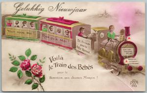 MULTIPLE BABIES in a TOY TRAIN VINTAGE POSTCARD w/ BELGIAN STAMP