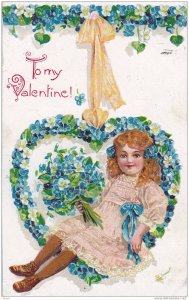 To my Valentine, Girl holding blue flowers sitting in heart-shaped swing held...