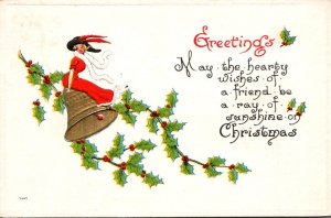 Christmas Greetings Girl Sitting On Gold Bell 1914