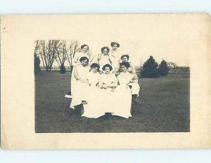 Pre-1918 rppc GROUP OF EIGHT WOMEN ALL IN WHITE DRESSES HM0134