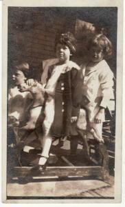RPPC   CHILDREN on HOBBY HORSE   postcard