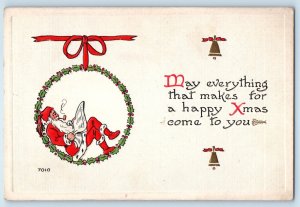c1910's Christmas Santa Claus Pipe Smoking Wreath Berries Lititz PA Postcard