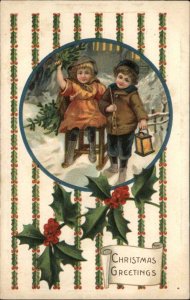 Christmas Children Sled Lantern Embossed c1910s Postcard