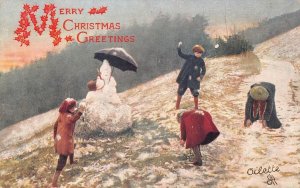 CHRISTMAS HOLIDAY SNOWMAN ON ROCK UMBRELLA HOOKAK PIPE CHILDREN UK POSTCARD 1906