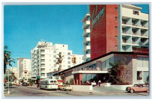 c1960s Famous Collins Avenue Looking North From 41st St. Miami Beach FL Postcard 