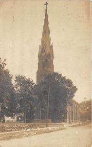 Sterling Illlinois~Sacred Heart Catholic Church~Cross on Tall Steeple~c1910 RPPC