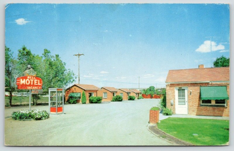 Pueblo Colorado~Bell Motel~Telephone Booth by Neon Art Deco Sign~1959 Postcard 