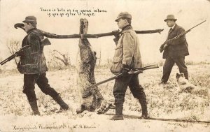 RPPC Big Game in Iowa Hunters Rifles Rabbit Exaggeration 1909 Vintage Postcard