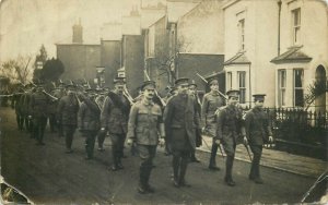 United Kingdom military 7 rank company marching real photo postcard