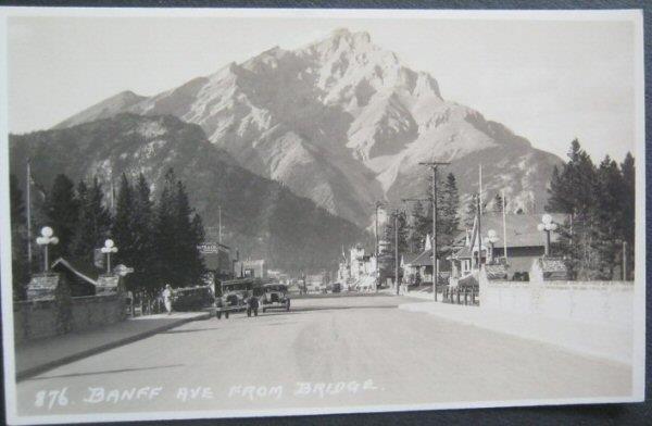 Banff Avenue From Bridge (with old cars) Banff Canada RPPC