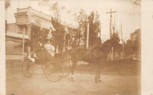 RPPC HORSE CARRIAGE BLACK AMERICANA CAMERA GUN RANGE EXHIBIT PHOTO POSTCARD