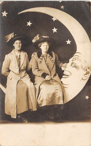 Women Posing in Moon Backdrop Women Posing in Moon Backdrop