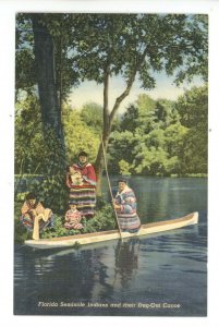 FL - Silver Springs. Seminole Indians on Ocklawaha River with Dugout Canoe