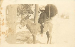 RPPC Postcard African American Boy Riding a Donkey