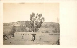 c1910 RPPC Postcard; Man Standing outside Adobe House, Unknown Arizona Location