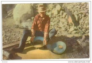 Mining/mines  Man panning for gold, California/Nevada, USA, 40-50s
