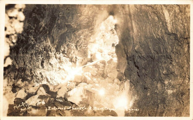 BEND OREGON~ENTRANCE OF LAVA CAVE~PHOTO ART STUDIO 1940s REAL PHOTO POSTCARD