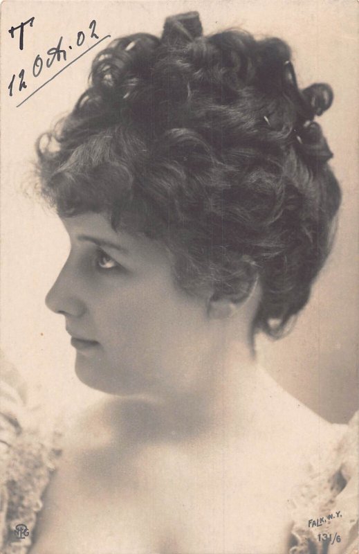 Charismatic Woman Posing from Profile Curly Hairstyle in Bun 1902 postcard