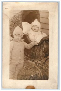 c1910's Cute Little Boys Toddler In Stroller Bonnet RPPC Photo Antique Postcard