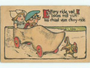 Unused Pre-Linen comic GIRL AND BOY RIDING IN SHOE SHAPED CAR k9337
