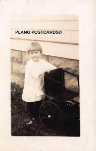 EARLY 1900'S GIRL WITH SMALL ROLLING CHAIR RPPC REAL PHOTO POSTCARD