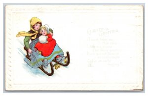 Children On Sled Christmas Greetings Embossed DB Postcard R10