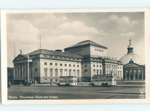 old rppc DUNLOP TIRE SIGN ON OLD BUS BESIDE BUILDING Berlin Germany HM2095