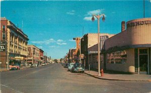 Brainerd Minnesota Looking North Sixth Street Autos Service News Postcard 21-653