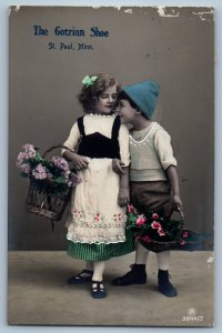 1914 The Gotzian Shoes St. Paul MN Children With Flowers RPPC Photo Postcard