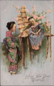 New Year Asian Japanese Girl Tickles Boy with Feather c1910 Vintage Postcard