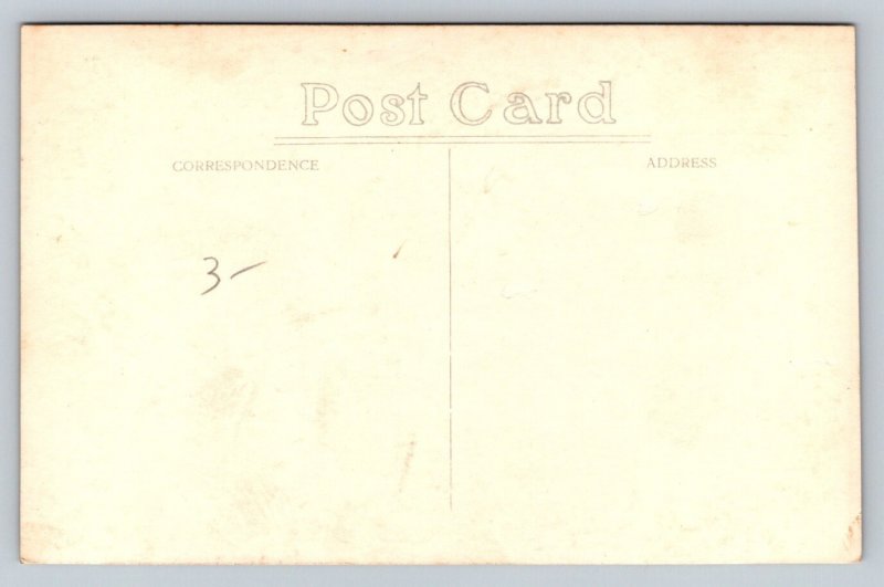 RPPC  Native Worker Harvesting Rubber Tree  c1920  Postcard