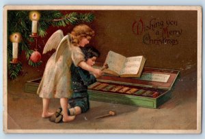 c1910's Christmas Angel Teaching Child Boy Playing Lyre Embossed Postcard