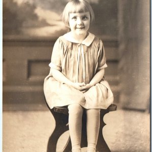 c1910s Adorable Little Girl RPPC Cute Happy Smile Sitting Child Real Photo A143