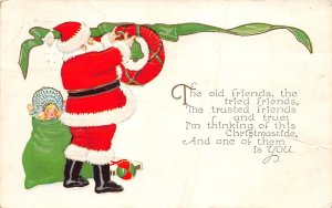 J34/ Santa Claus Christmas Postcard c1910 Wreath Toys Doll 182