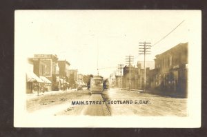 RPPC SCOTLAND SOUTH DAKOTA DOWNTOWN MAIN STREET SCENE REAL PHOTO POSTCARD