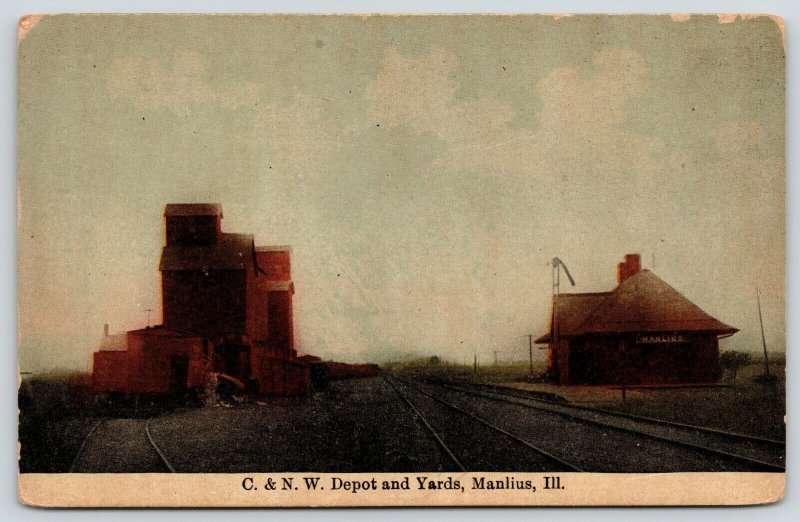 Manlius Illinois~C&NW Railroad Depot & Yards~Grain Elevators~c1910 Postcard 