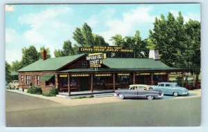 CODY, WY Wyoming BUFFALO BILL CABIN COURT c1950s Cars Roadside   Postcard