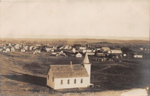 J61/ Philip South Dakota Postcard RPPC c1910 Church Building Homes 137