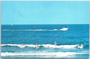 VINTAGE POSTCARD SURFING AT VIRGINIA BEACH VIRGINIA 1960s