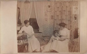 RPPC WOMEN BOOK WRITING COLLEGE DORMITORY REAL PHOTO POSTCARD (c. 1910)