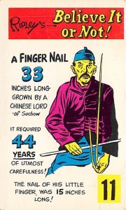 A fingernail 33 inches long, grown by a Chinese Lord Ripley's Believe it or N...