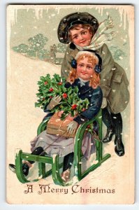 Christmas Postcard Children Girl On Sled Snow Flakes Icicles Germany Embossed