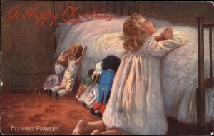 Tuck Christmas Evening Prayers Little Girl Praying with Dolls c1910 Postcard