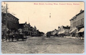 1912 COUNCIL GROVE MAIN STREET LOOKING WEST DIRT ROAD HORSES WAGON POSTCARD