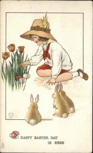 Tuck Joyous Youth Bunnies Little Boy Easter Egg Hunt c1910 Vintage Postcard