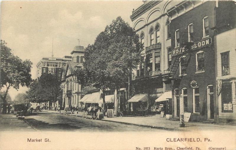 c1906 Lithograph Postcard  Market Street Scene Clearfield PA Hotel Bloom posted 